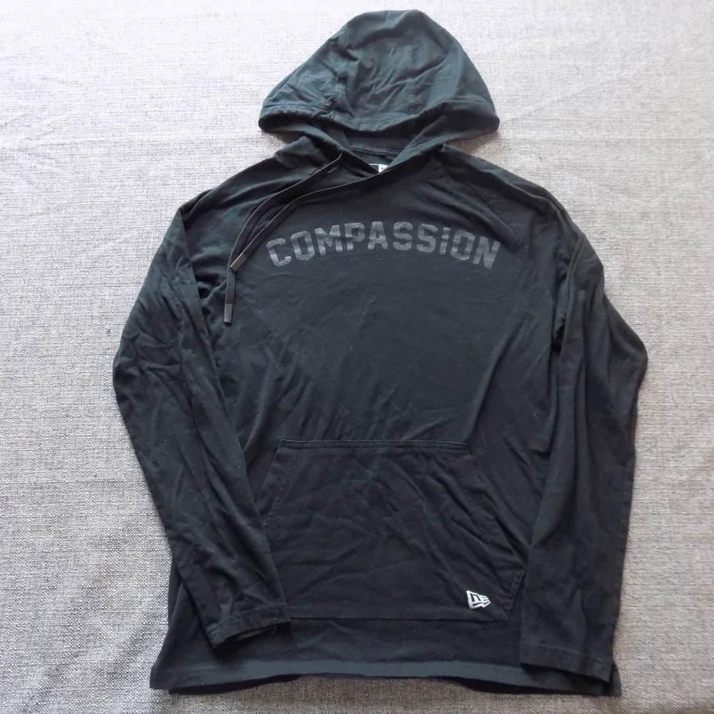New Era Hooded T-Shirt Mens Medium Black Good Compassion Graphic Long Sleeve